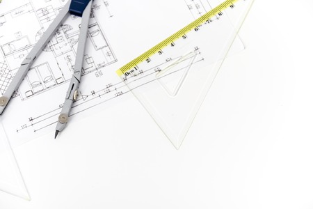 Photo of the Architectural project, pair of compasses, rulers and calculatorの写真素材