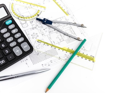 Photo of the Architectural project, pair of compasses, rulers and calculator