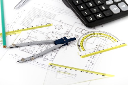 Photo of the Architectural project, pair of compasses, rulers and calculatorの写真素材