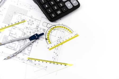 Photo of the Architectural project, pair of compasses, rulers and calculatorの写真素材