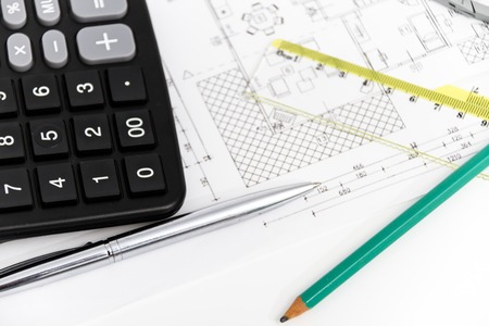 Photo of the Architectural project, pair of compasses, rulers and calculatorの写真素材