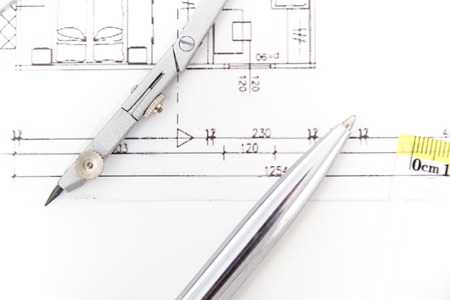 Photo of the Architectural project, pair of compasses, rulers and calculator