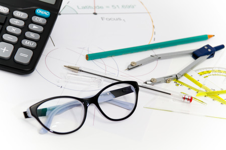 Photo of the Business Architectural project, pair of compasses, glasses, rulers and calculator - business conceptの写真素材