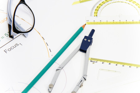 Photo of the Business Architectural project, pair of compasses, glasses, rulers and calculator - business conceptの写真素材