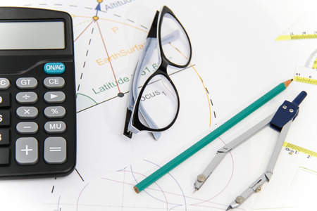 Photo of the Business Architectural project, pair of compasses, glasses, rulers and calculator - business conceptの写真素材