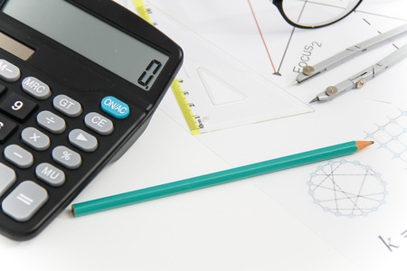 Photo of the Business Architectural project, pair of compasses, glasses, rulers and calculator - business conceptの写真素材