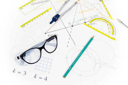 Photo of the Business Architectural project, pair of compasses, glasses, rulers and calculator -...