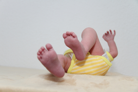 Photo of the Newborn 20 days  baby feetsの写真素材