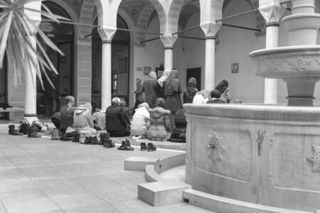 Photo of the Prayer performing by muslim womenの写真素材