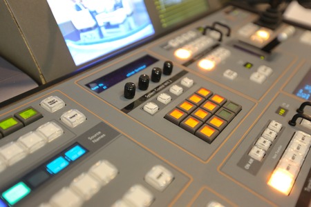 Photo of the TV broadcasting, working with video and audio mixerの写真素材