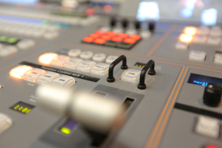 Photo of the TV broadcasting, working with video and audio mixerの写真素材