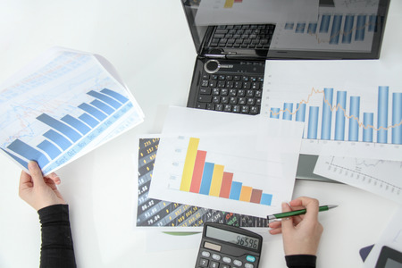 Startup business, Closeup of businesswoman hands, working in office room, Business development conceptの写真素材