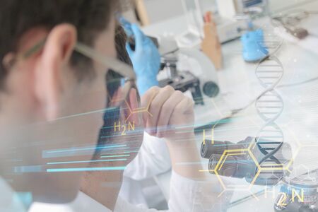 Group of young Laboratory scientists working at lab with test tubes and microscope, test or research...