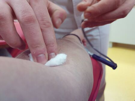 Concept Coronavirus. Close up blood test from vein. Coronavirus 2019-nCoV Blood Sample. Corona virus outbreaking. Epidemic virus Respiratory Syndromeの写真素材