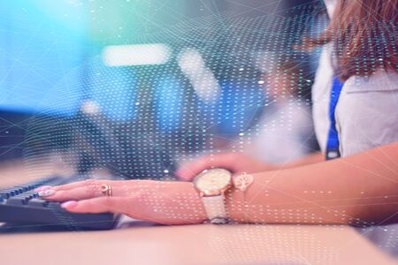 Group of security guards working on computers while sitting in the main control room, CCTV surveillance.の写真素材