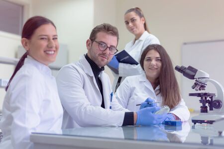 Concept Coronavirus. 2019-nCoV. Scientists or doctors research for Corona virus treatment and solution. Research in lab or hospital.の写真素材