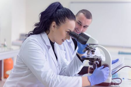 Concept Coronavirus. 2019-nCoV. Scientists or doctors research for Corona virus treatment and solution. Research in lab or hospital.の写真素材