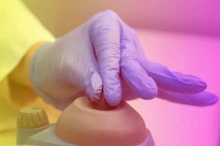 Young female Laboratory scientist working at lab with test tubes, test or research in clinical laboratory.Science, chemistry, biology, medicine and people concept.の写真素材