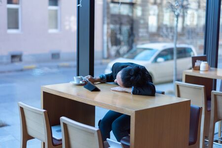 Startup Diversity Brainstorming  Concept.Tired young Business woman waiting for results of  Economy...