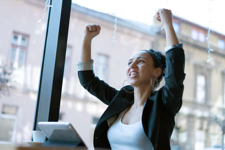 Startup Diversity Brainstorming  Concept. Pretty young Business woman celebrating for succes while...
