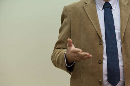 Selective focus on  teacher  while teaching and explaining lessons to students in classroom....
