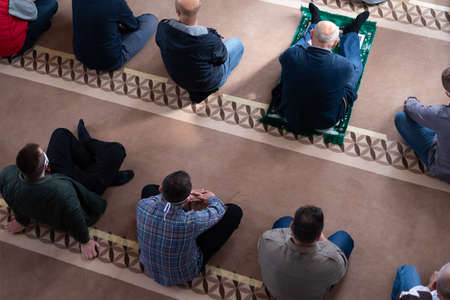 Sarajevo, Bosnia and Herzegovina; Omer ibn Hattab mosque; 17th  october 2020;  People praying in the mosque due to the epidemic are worshiping in accordance with the social distance rules. Covid-19, corona virusの写真素材
