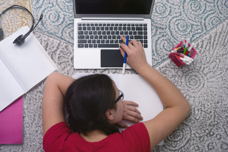 Coronavirus. Quarantine. Online training education and freelance work. Computer, laptop and girl...