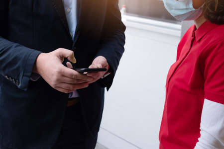 Event QR code ticket scanning before begining of business conferenceの写真素材