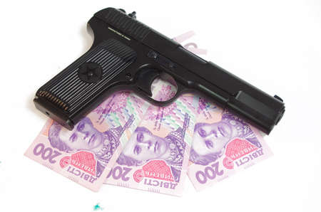 A hand Gun and Money set on a white background base の写真素材