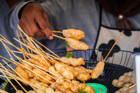 Cilor or Cilung, Indonesian traditional street food being fried.の写真素材