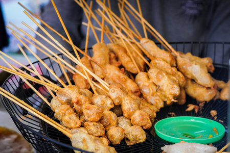 Cilor or Cilung, Indonesian traditional street food being fried.の写真素材