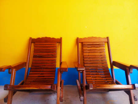 two armchair put with the color wallの写真素材