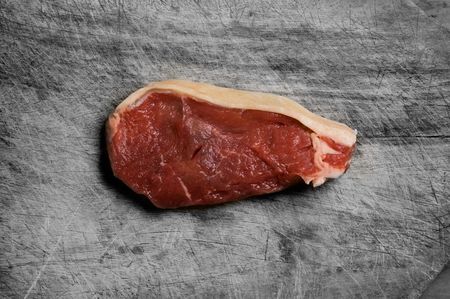 Steak on wooden table.の写真素材