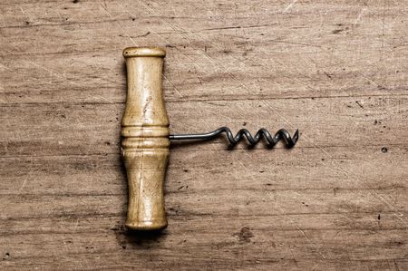 Corkscrew on wood.の写真素材