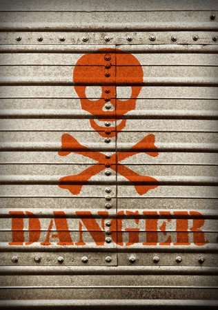 Steel plate background wiht hazard symbol and danger text.の写真素材
