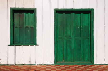 Old wooden door and window in a house in Nicaragua.の写真素材