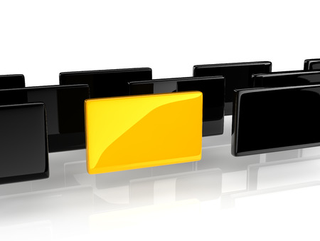 a yellow rectangle placed observably in a group of black rectangles.の写真素材