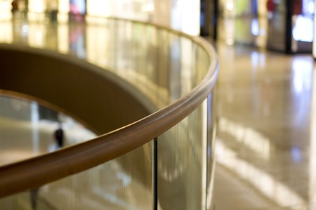 night mall guardrail with light reflection on it.の写真素材