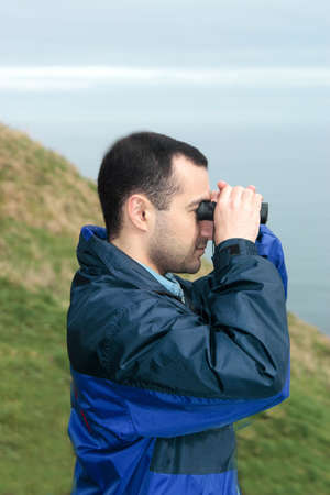 Man with binoculars