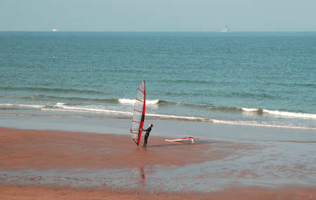Windsurfer at the beachの写真素材
