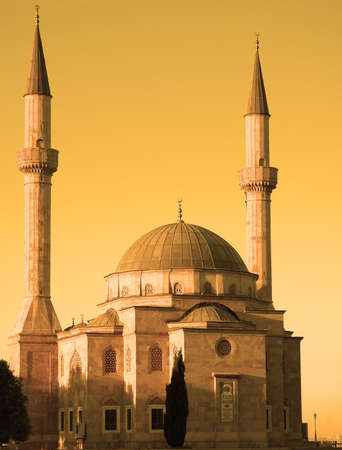 Mosque with two minarets in Baku, Azerbaijan at sunsetの写真素材