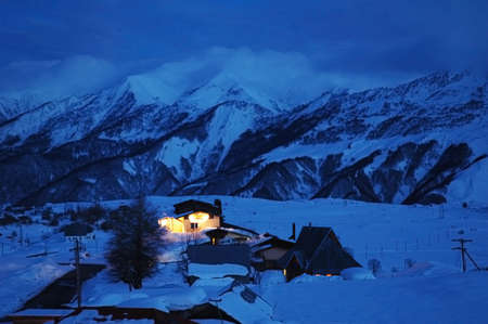 House in winter during dusk timeの写真素材