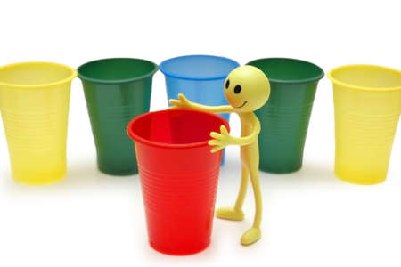 Figure of Smiley and colourful cupsの写真素材