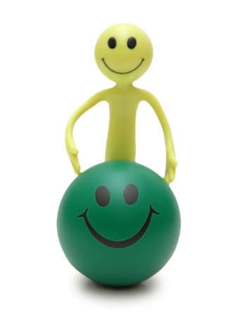 Figure Smiley and ball isolated on whiteの写真素材