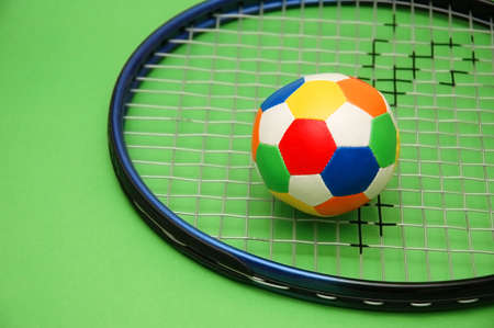 Tennis racket and footballの写真素材