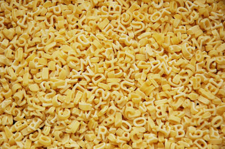 Alphabet pasta as a backgroundの写真素材