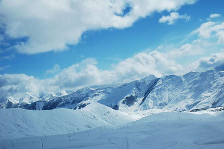 Winter mountains and blue skyの写真素材