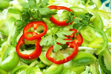 shredded herbs and red peppersの写真素材