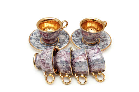 Cups and saucers isolated on the whiteの写真素材