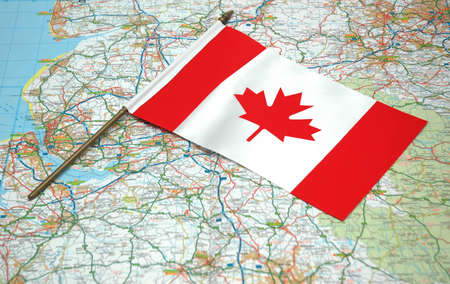 Flag of Canada over the mapの写真素材